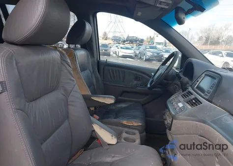 2009 Honda Odyssey Touring z USA, uszkodzony, nr VIN 5FNRL38939B008918